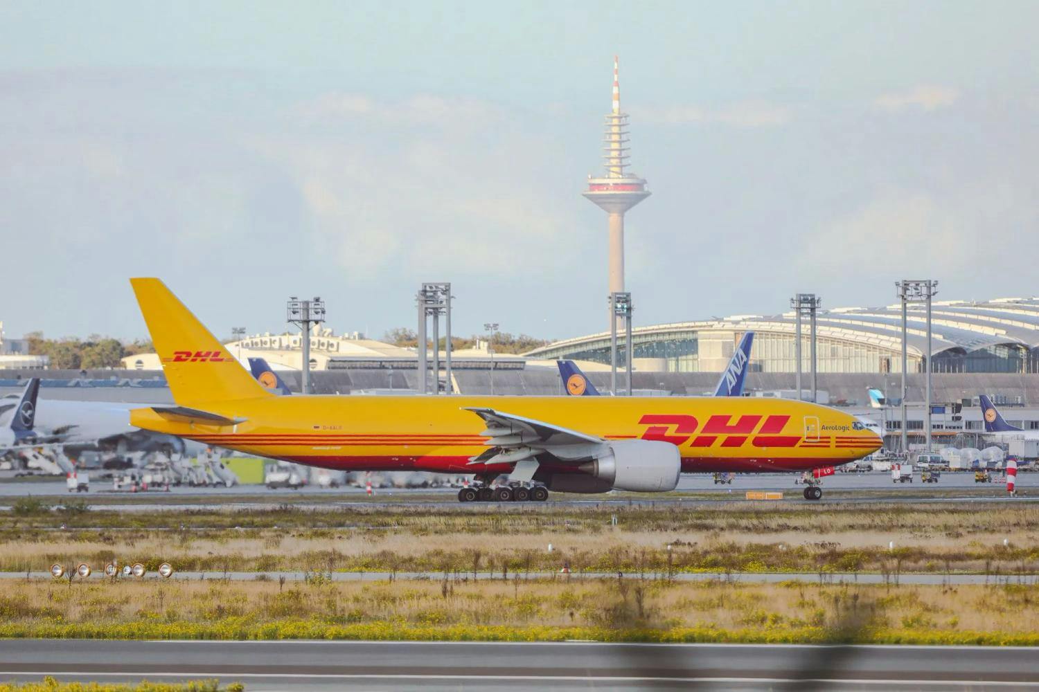 How does DHL’s “On Demand Delivery” make international shipping easier?